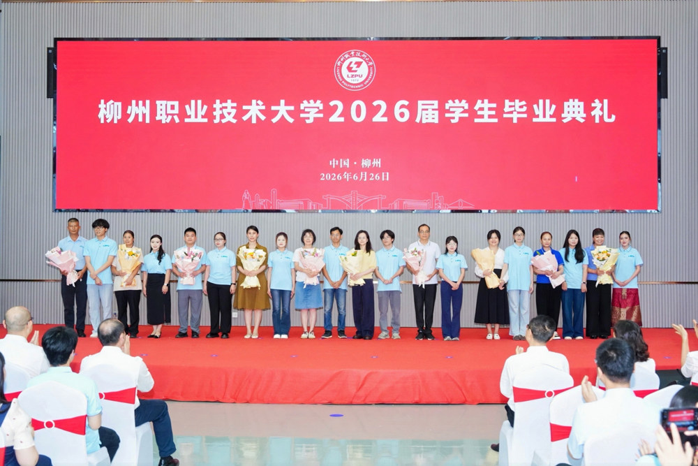 Graduate Representatives Present Flowers